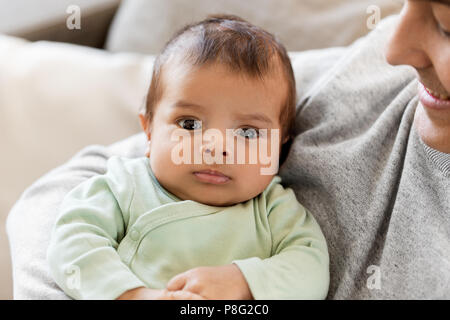 close up of father holding little baby boy Stock Photo