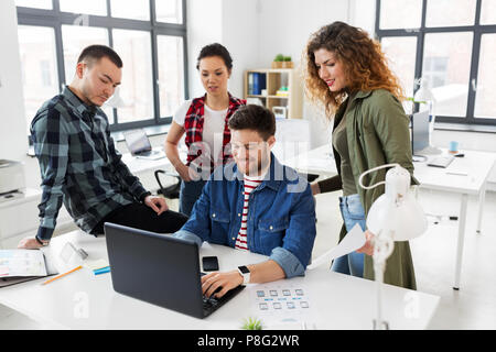 creative team working on user interface at office Stock Photo