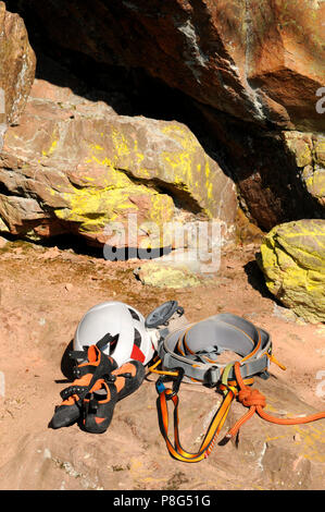 Climbing Equipment, rock climbing, climbing harness, webbing, figure-eight knot, helmet, climber's shoes Stock Photo