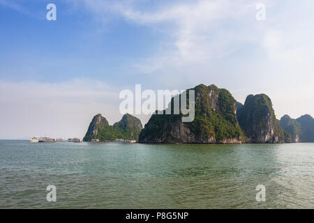 Tourist boats swarm around the harbour, Dao Go Island, Ha Long Bay, Quảng Ninh Province, Viet Nam Stock Photo