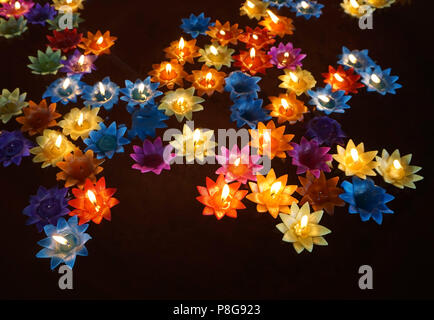 Many of colourful Floating candles Stock Photo