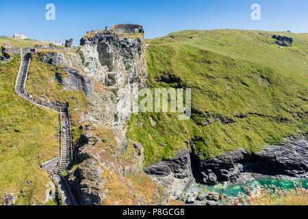 Tintagel Castle view from Tintagel Island with the South West Coast Path to the left, North Cornwall, Cornwall, England, UK Stock Photo