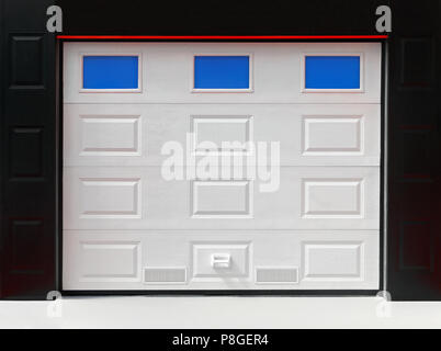 Closed white garage  door made from plastic Stock Photo
