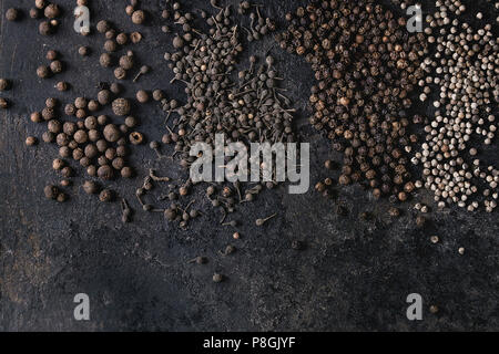 Texture Background Different Variety of different black peppers allspice, pimento, long pepper ...