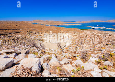 Ancient ruins in the island of Delos in Cyclades, one of the most important mythological, historical and archaeological sites in Greece. Stock Photo