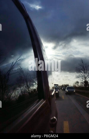 Hannover, Germany, cars driving at dusk on the A2 in a construction site Stock Photo