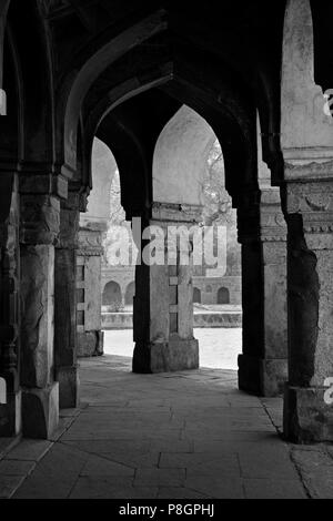 Stone PILLARS support the TOMB of ISA KHAN on the grounds of HUMAYUN'S TOMB - NEW DELHI, INDIA Stock Photo