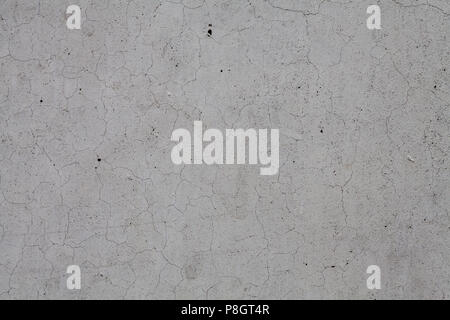Concrete slab wall with hairline cracks Stock Photo