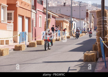Classic Motorcycle racing in the streets of Alguena, Spain Stock Photo