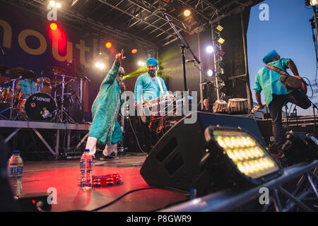 Shilloete of Girl Dancing at Exmouth Festival Stock Photo