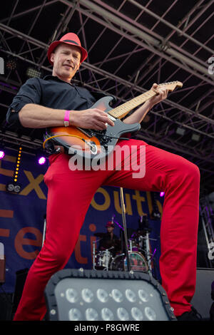 Guitarist posing at Exmouth Festival Stock Photo