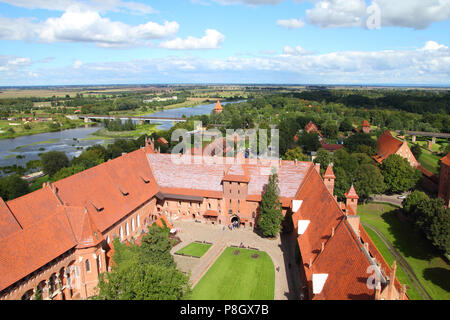 Malbork castle in Pomerania region of Poland. UNESCO World Heritage Site. Teutonic Knights' fortress also known as Marienburg - aerial view. Stock Photo