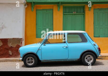 RETHYMNON, GREECE - MAY 23: Mini Cooper car parked on May 23, 2013 in Rethymnon, Crete, Greece. Mini Cooper is a popular oldtimer car manufactured in  Stock Photo