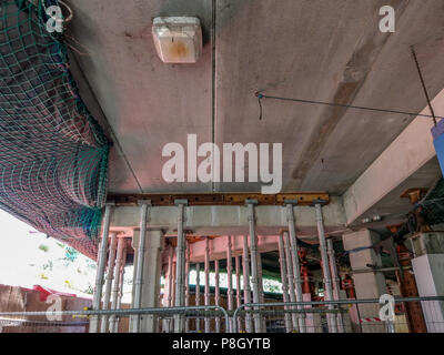 Bournemouth, UK. 11th July 2018. Work starts on the repairs to the crumbling multistory car park at Castlepoint in Bournemouth. The much-delayed repairs come after the concrete structure first started falling apart in 2003. The repair work is due to take 5 years and the shops remain open. Credit Thomas Faull / Alamy Live News Stock Photo