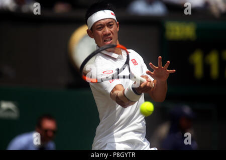 Kei Nishikori during his match against Arthur Rinderknech on day three ...