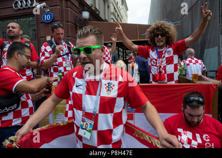 Moscow, Russia. 11th July, 2018. Croatian football fans cheer at Nikolskaya street of Moscow before the game England vs Croatia of  the World Cup FIFA 2018 Russia Stock Photo