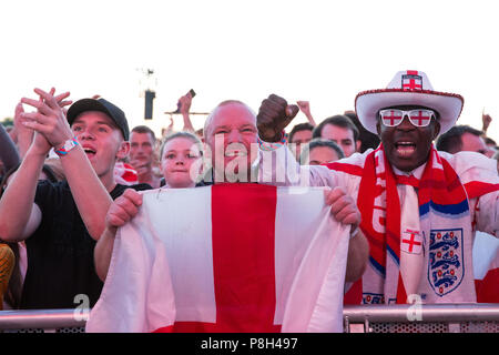 London, UK. 11th July, 2018. 30,000 England fans attend the public screening of the FIFA 2018 World Cup semi-final between England and Croatia in Hyde Park, the largest such screening of a football match since 1996. The event was organised by the Mayor of London and Government in conjunction with the Royal Parks, the Football Association and other agencies. The match provides England with the chance to reach their first World Cup final since 1966. Credit: Mark Kerrison/Alamy Live News Stock Photo