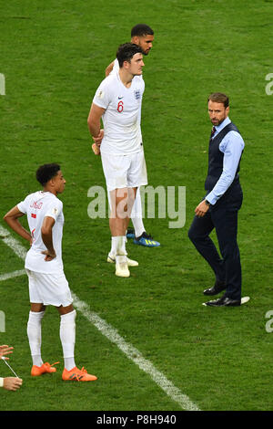 Moscow, Russia. 11th July, 2018.  Gareth SOUTHGATE (coach, ENG) with Harry MAGUIRE (ENG), Jesse LINGARD (ENG), disappointed, frustrated, dejected after game end, Action, Croatia (CRO) - England (ENG) 2-1 nV Semifinals, Round of Four, Game 62 on 11.07.2018 in Moscow, Luzhniki Stadium, Football World Cup 2018 in Russia from 14.06. - 15.07.2018. | usage worldwide Credit: dpa/Alamy Live News Credit: dpa picture alliance/Alamy Live News Stock Photo