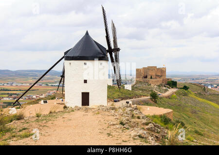 View of windmills of Consuegra and the Castille do la Muela Stock Photo