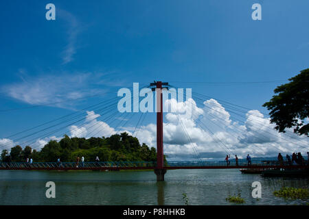 A Hanging bridge on Kaptai Lake in Rangamati. Kaptai Lake is a man; made lake in south; eastern Bangladesh. It is located in the Rangamati District of Stock Photo