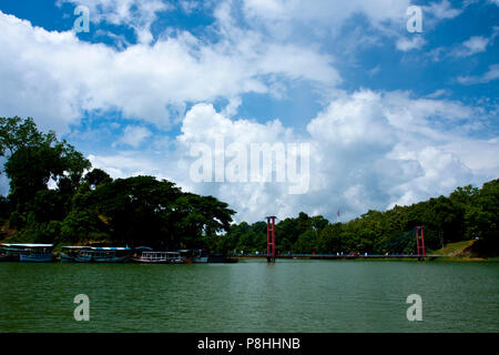 A Hanging bridge on Kaptai Lake in Rangamati. Kaptai Lake is a man; made lake in south; eastern Bangladesh. It is located in the Rangamati District of Stock Photo