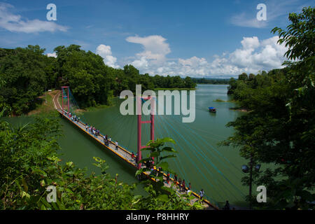 A Hanging bridge on Kaptai Lake in Rangamati. Kaptai Lake is a man; made lake in south; eastern Bangladesh. It is located in the Rangamati District of Stock Photo