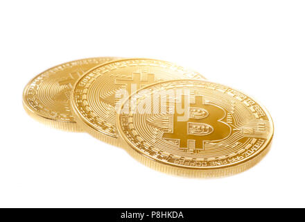Bitcoin. Physical bit coin. Digital currency. Cryptocurrency. Golden coin with bitcoin symbol isolated on white background. Stock Photo