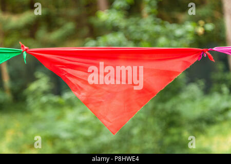 Red flag of a garland Stock Photo