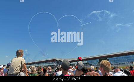 Red Arrows RAF Air Display Team, creating a heart in the sky, British Grand Prix, 2018, Silverstone, Silverstone Circuit, Towcester NN12 8TL Stock Photo