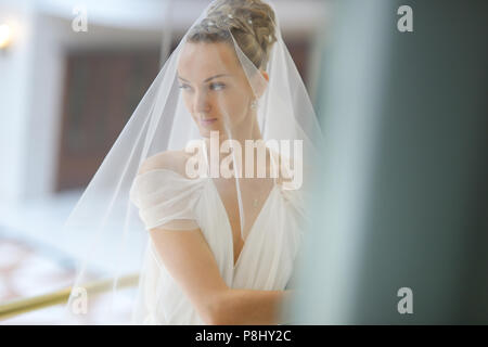 The beautiful bride in an interior Stock Photo