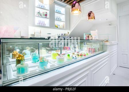 Cake counter with a wide selection, at the local cake boutique Stock Photo