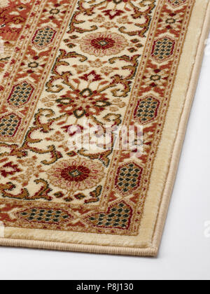 Oriental ornament rug isolated on white background. Stock Photo