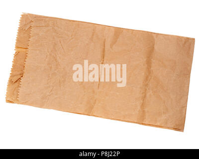 Real, wrinkled brown paper bag isolated on white. Traditional packaging or for background. Stock Photo