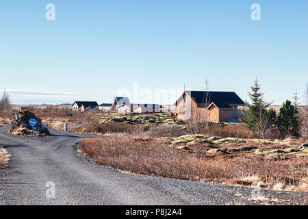 22 April 2018: Grimsnes, South Iceland - Icelandic summerhouses on a clear morning. Stock Photo
