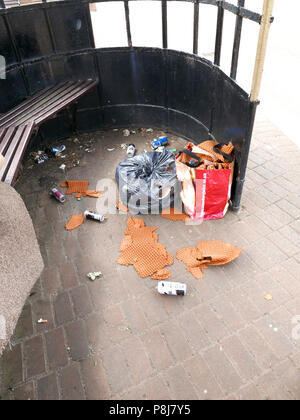 Rubbish dumped in tram shelter,Fleetwood,Lancashire,UK Stock Photo
