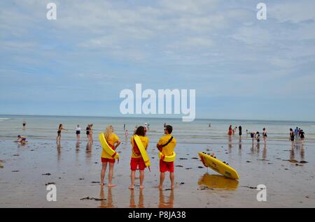 male and female lifeguards on broadstairs beach kent UK Stock Photo