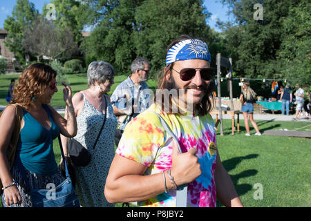 BORGO DI TRAGLIATA, ROME, ITALY - JULY 8, 2018: Hippie people participating at the seventh season of Woodstock, born from the desire to bring together Stock Photo