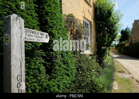 Direction sign on The Cotswold Way at Broadway village in The Cotswolds Stock Photo