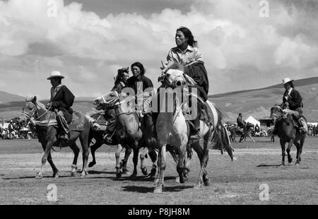 Khampas, the warrior horseman of old Tibet,  compete at the Litang Horse Festival - Kham, Sichuan Province, China, (Tibet) Stock Photo