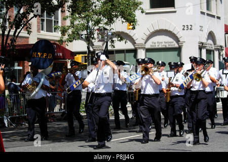 NEW YORK, NY - AUGUST 21: NYPD Band marches in the 36th India Day Parade to celebrate India's Independence Day on Madison Avenue, Manhattan, NY Stock Photo