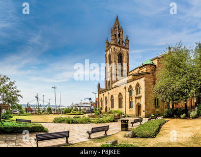 Parish Church of Our Lady and St. Nicholas.  This historic church features a spire once used for shipping navigation, plus scenic gardens. Stock Photo