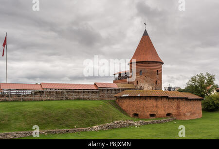 The round tower and the bastion of the mid-14th century, Gothic style medieval castle situated in Kaunas, the second-largest city in Lithuania. Stock Photo