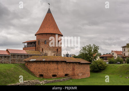 The round tower and the bastion of the mid-14th century, Gothic style medieval castle situated in Kaunas, the second-largest city in Lithuania. Stock Photo