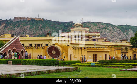 Jaipur, India - Jul 27, 2015. People at Astronomical Observatory (Jantar Mantar). Jantar Mantar is a collection of 19 instruments built by the Rajput  Stock Photo