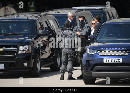 Metropolitan Police Counter Terrorist Specialist Firearms Officers wait for the arrival of US President Trump and Melania Trump at Stansted Airport, London, in Air Force One, for their first official visit to the UK. Stock Photo