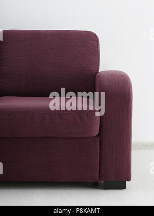 Sofa in white room. Close-up Stock Photo