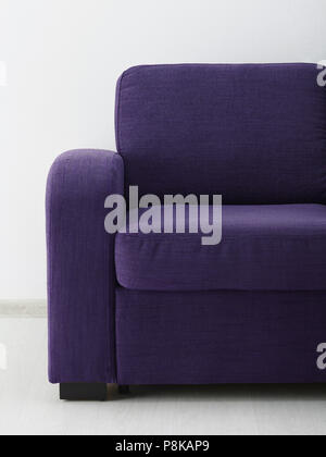 Sofa in white room. Close-up Stock Photo