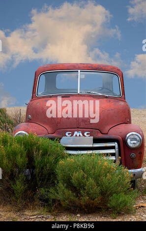 Abandoned 1951 GMC vintage red pickup truck, Taos New Mexico Stock Photo