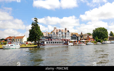 A view of the Southern Comfort pleasure boat moored near the Swan Inn on the Norfolk Broads at Horning, Norfolk, England, United Kingdom, Europe. Stock Photo