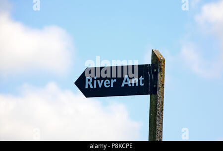 A remote sign indicating the River Ant for boat users on the River Bure on the Norfolk Broads near Horning, Norfolk, England, United Kingdom, Europe. Stock Photo